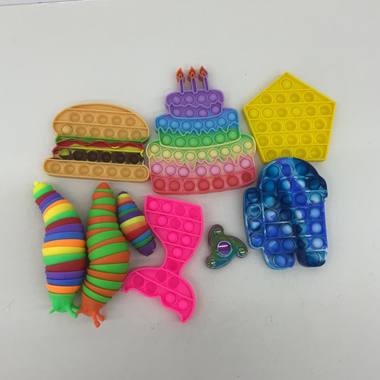 Colorful Rainbow Mixed Sensory Fidget Stress Toys Pop Its Wiggly Worms Used
