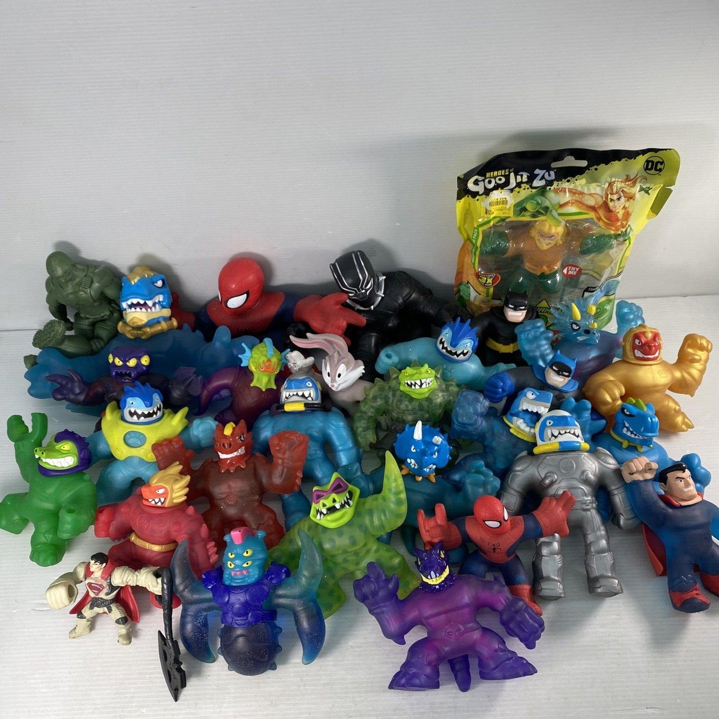 LOT 30 Moose Stretchy Squishy Goo Jit Zu Armstrong Hero Rubber Action Figures - Warehouse Toys