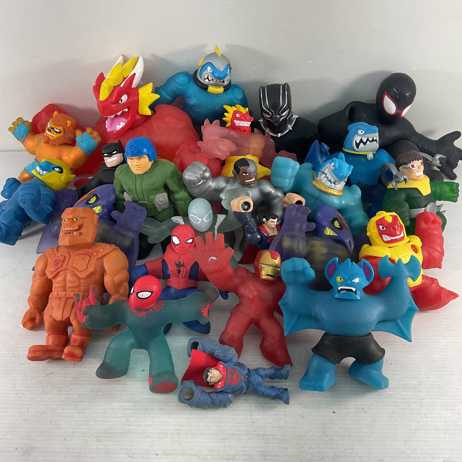 LOT of 22 Stretchy Squishy Toy Figures Stretch Armstrong Goo Jit Zu Jazwares DC - Warehouse Toys