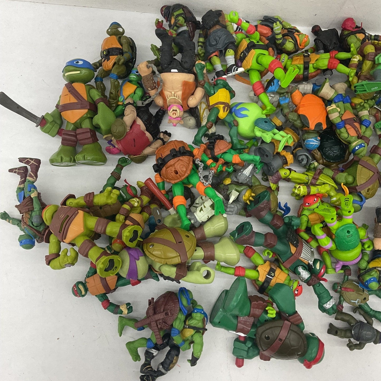 10 lbs Preowned TMNT Action Figure Collection Ninja Turtles LOT Toys Vehicles - Warehouse Toys