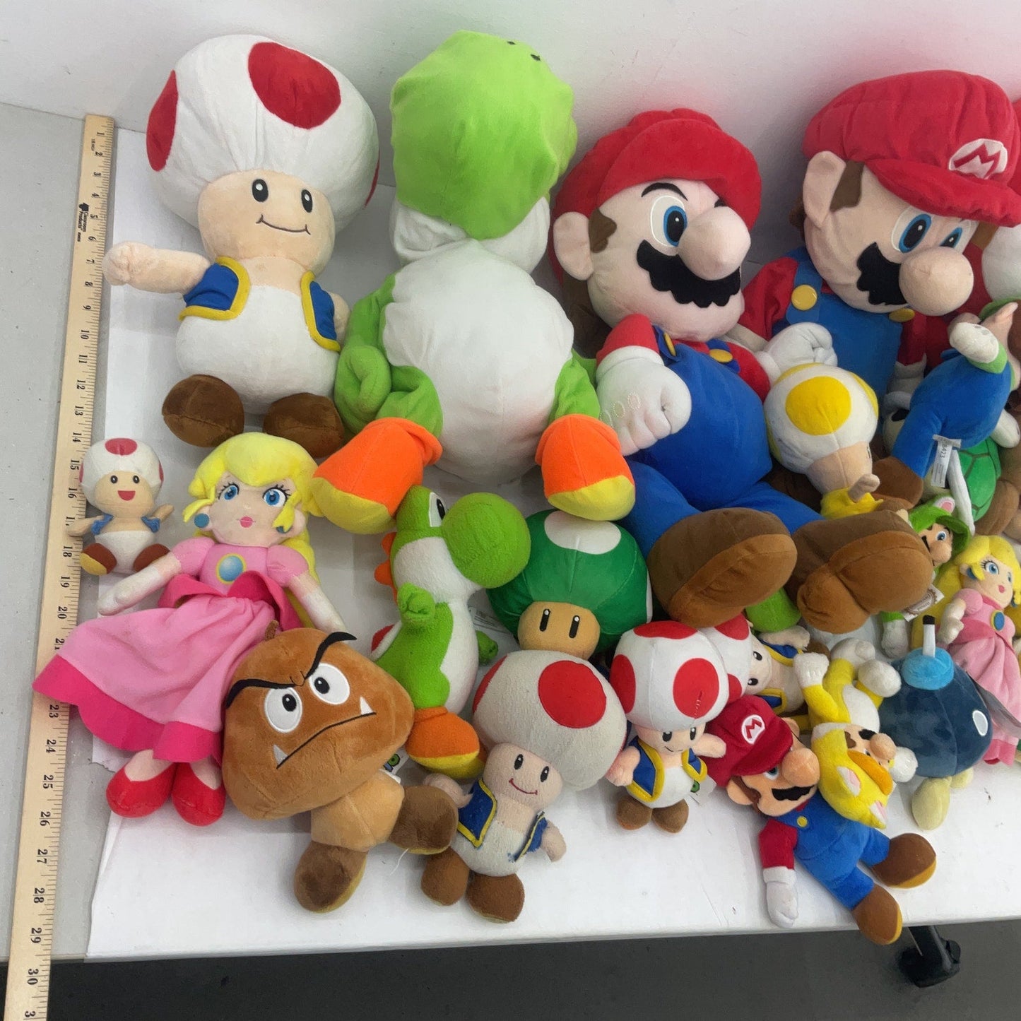 13 lbs Mixed Preowned LOT Nintendo Super Mario Shy Guy Yoshi Peach Plush Dolls - Warehouse Toys