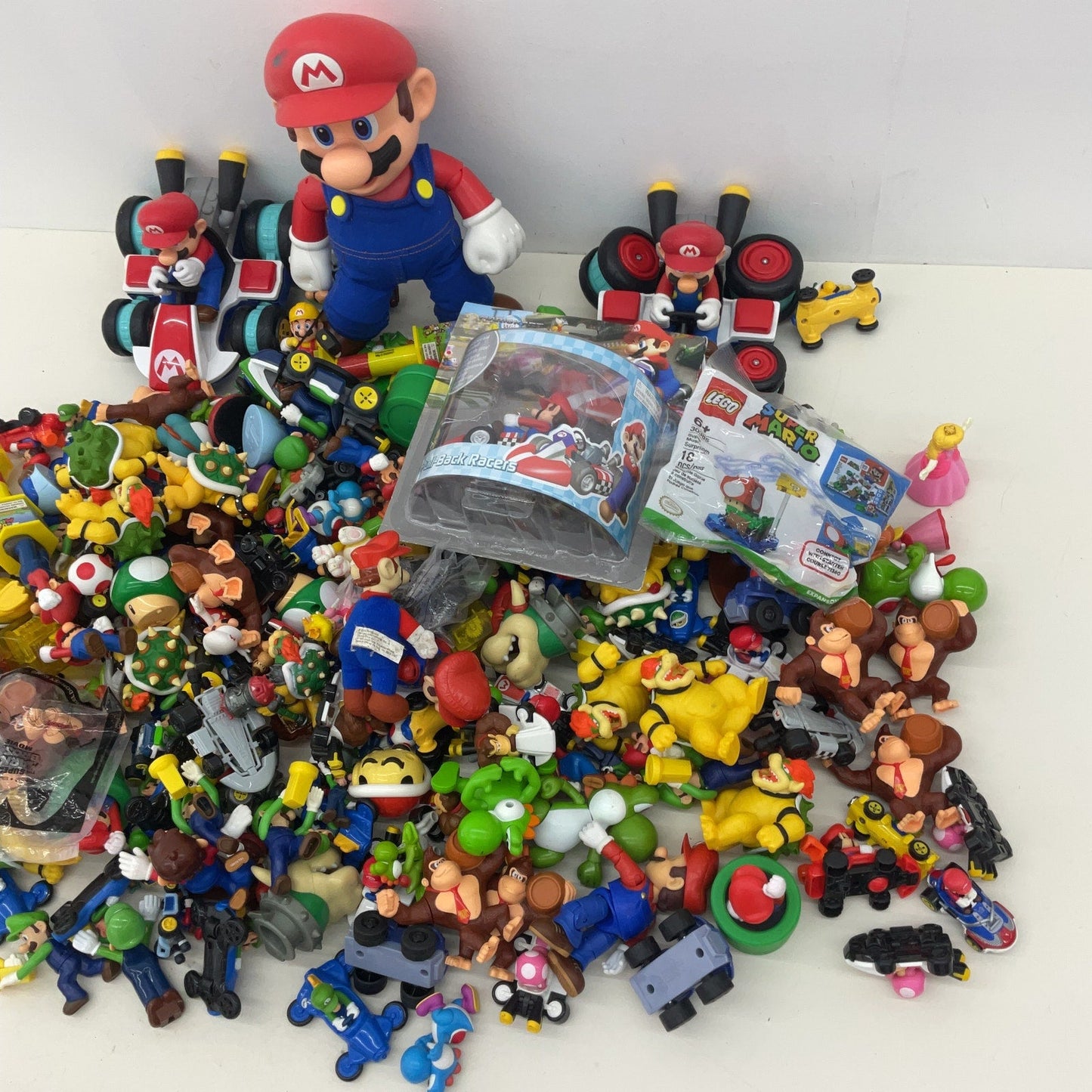 20 lbs Preowned Super Mario Kart Action Figures Vehicles Toys Accessories LOT - Warehouse Toys