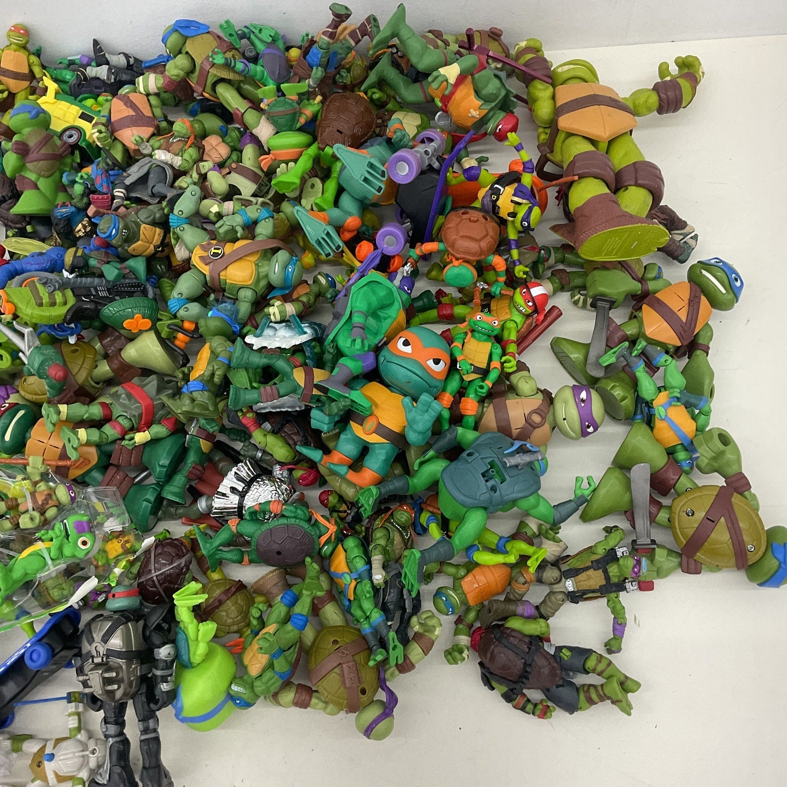 20 lbs Preowned TMNT Action Figure Collection Ninja Turtles LOT Toys Figures - Warehouse Toys