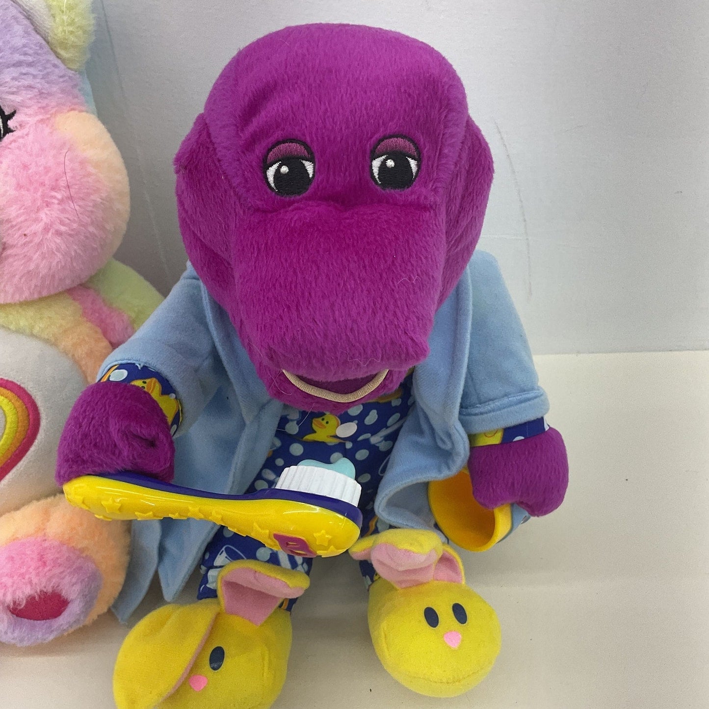 Barney the Purple Dinosaur in Pajamas & Rainbow Colored Care Bear Plush Toys - Warehouse Toys