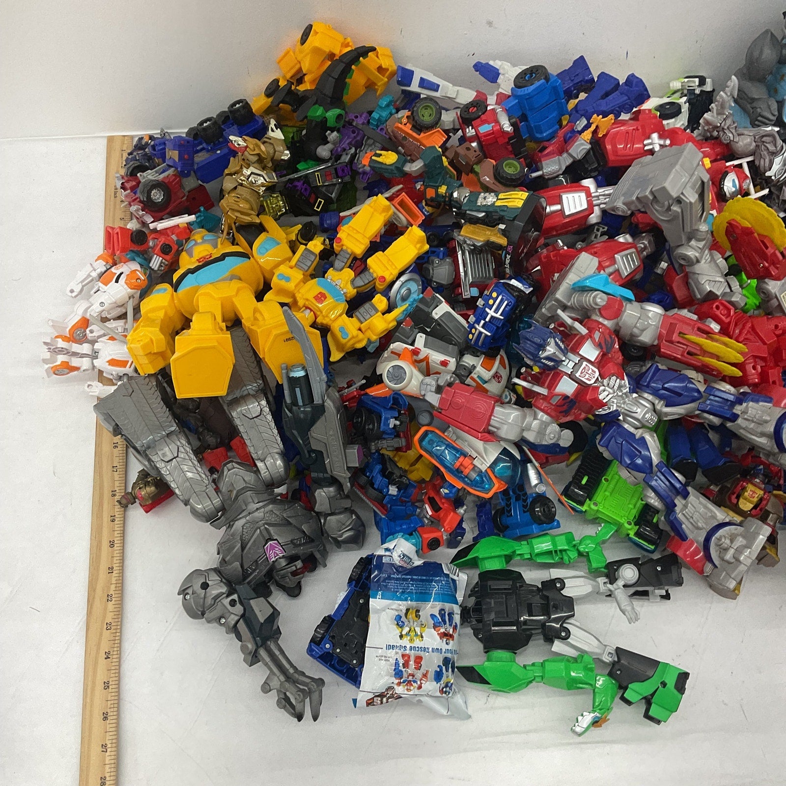 HUGE LOT 25 lbs Modern Transformers Optimus Prime Robots Preowned Action Figures - Warehouse Toys