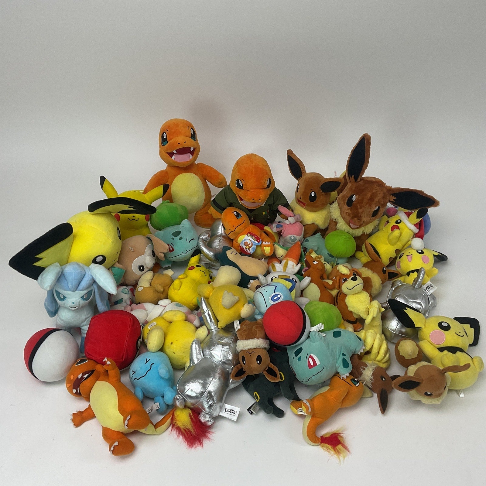 LOT Nintendo Pokemon Character Plush Toys Eevee Charmander Pichu Silver Pikachu - Warehouse Toys