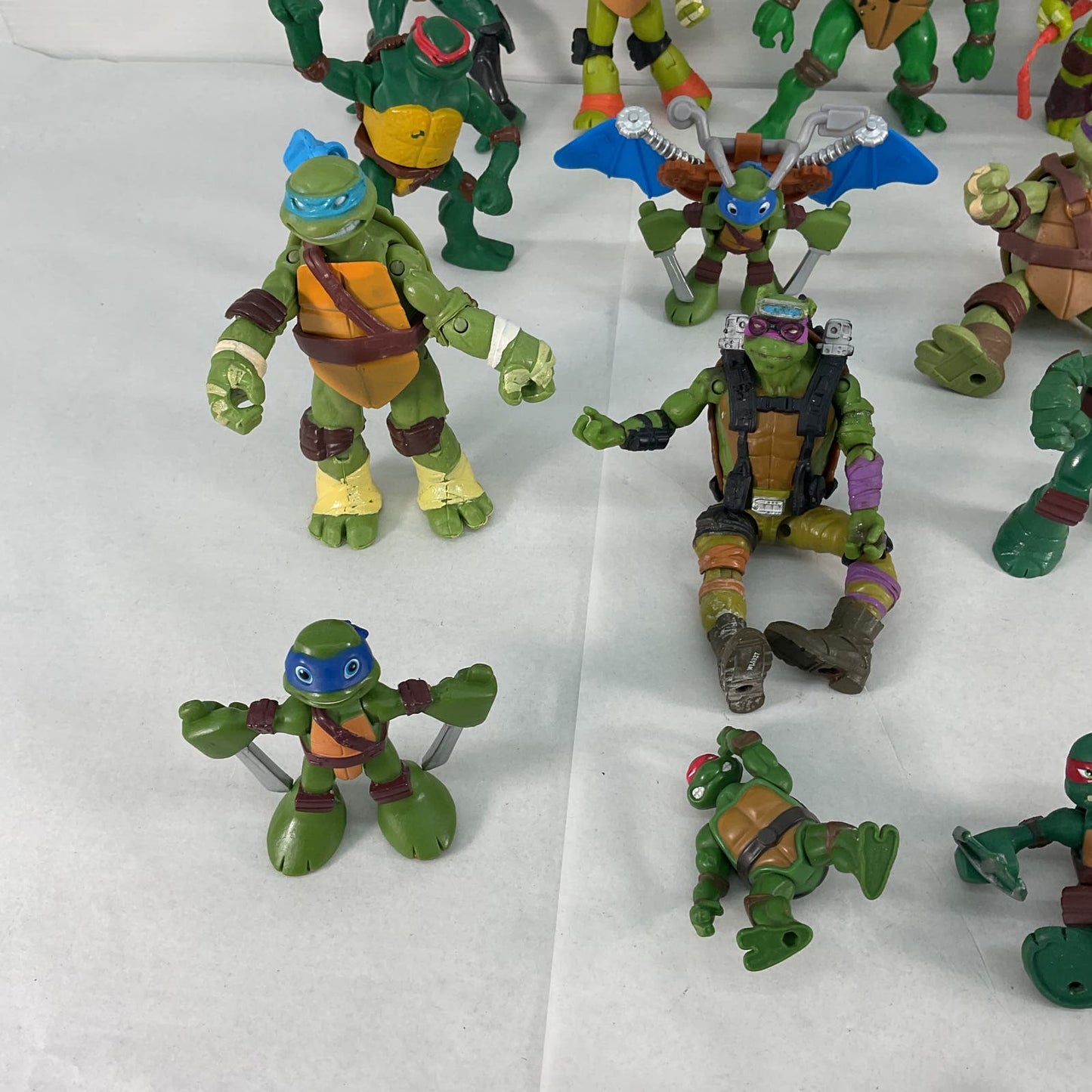 LOT of 21 Teenage Mutant Ninja Turtles Michelangelo Leo Raph Action Figures Toys Used - Warehouse Toys