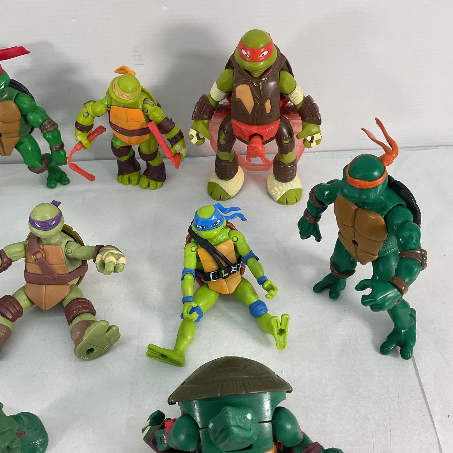 LOT of 21 Teenage Mutant Ninja Turtles Michelangelo Leo Raph Action Figures Toys Used - Warehouse Toys