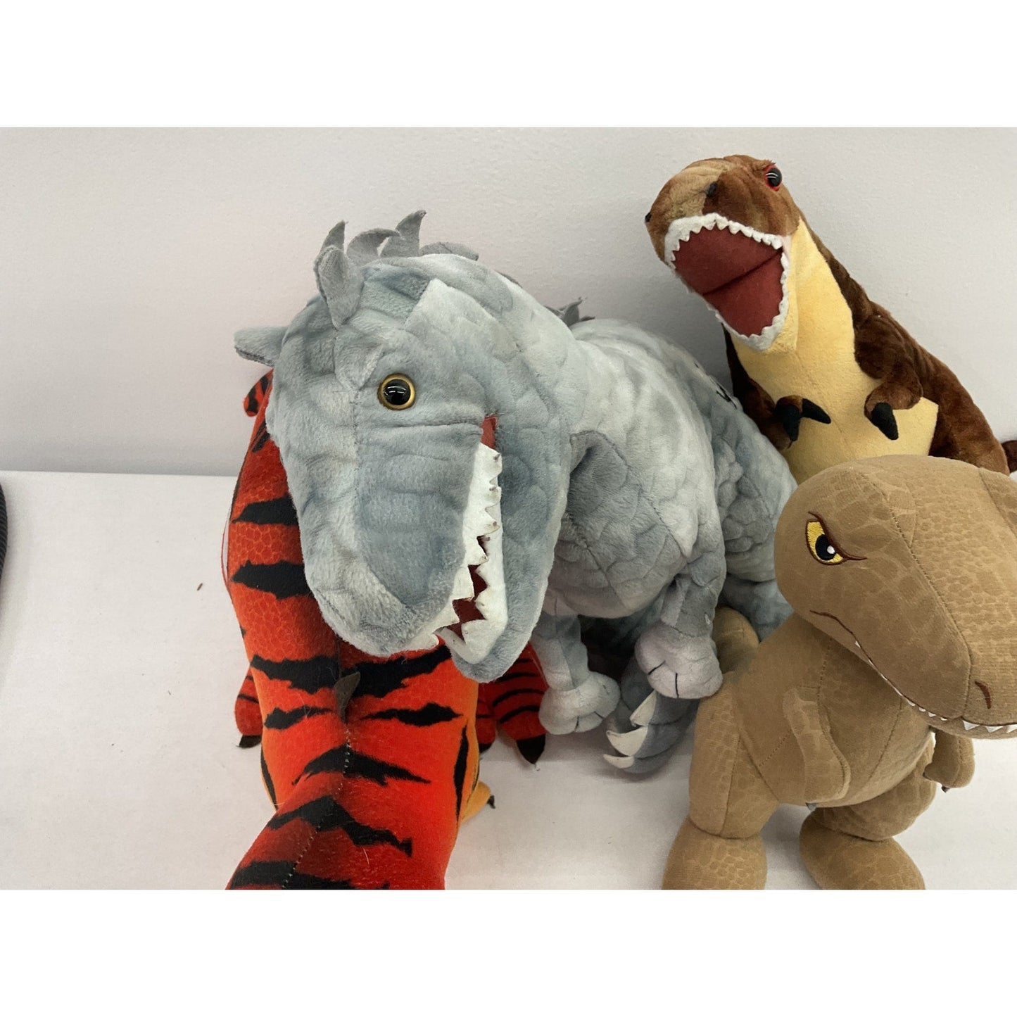 LOT of 4 Jurassic World Dinosaur Stuffed Animal Plush Toy Figures T - Rex - Warehouse Toys