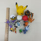 Mixed LOT Nintendo Pokemon Toy Figures Charizard Pikachu Bulbasaur Poke Balls - Warehouse Toys