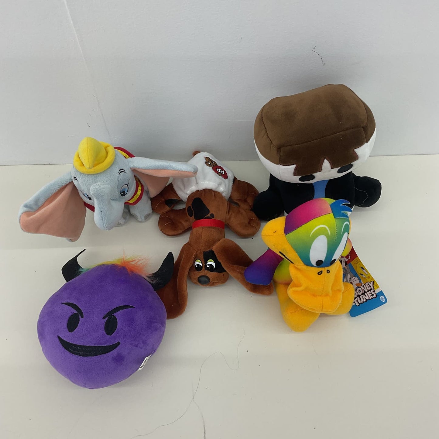 Mixed Plush Toys LOT Pound Puppies Disney Dumbo Looney Tunes Daffy Emoji Devil - Warehouse Toys