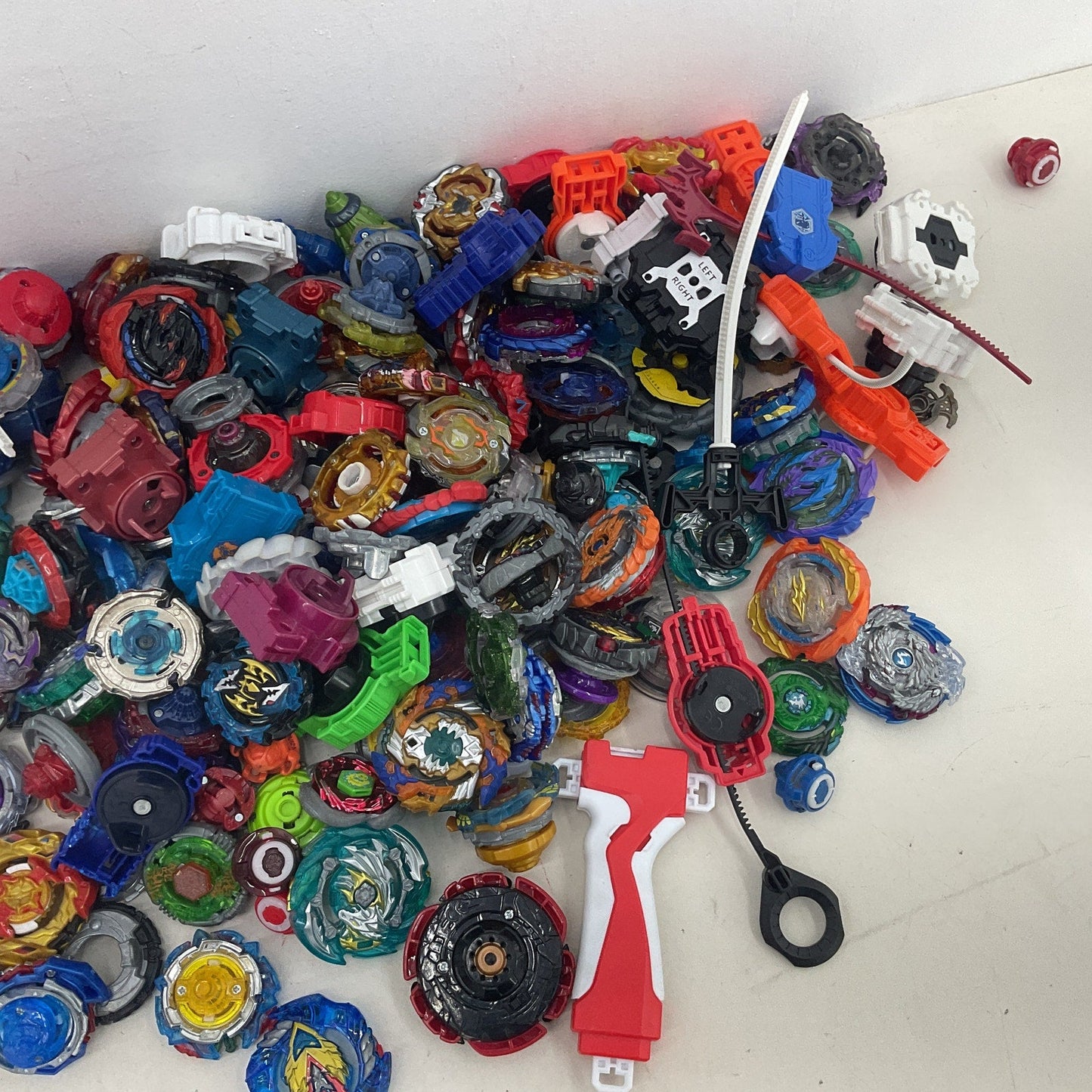 Preowned Beyblades Action Figure 10 lbs Collection LOT Toy Figures Parts Acc - Warehouse Toys