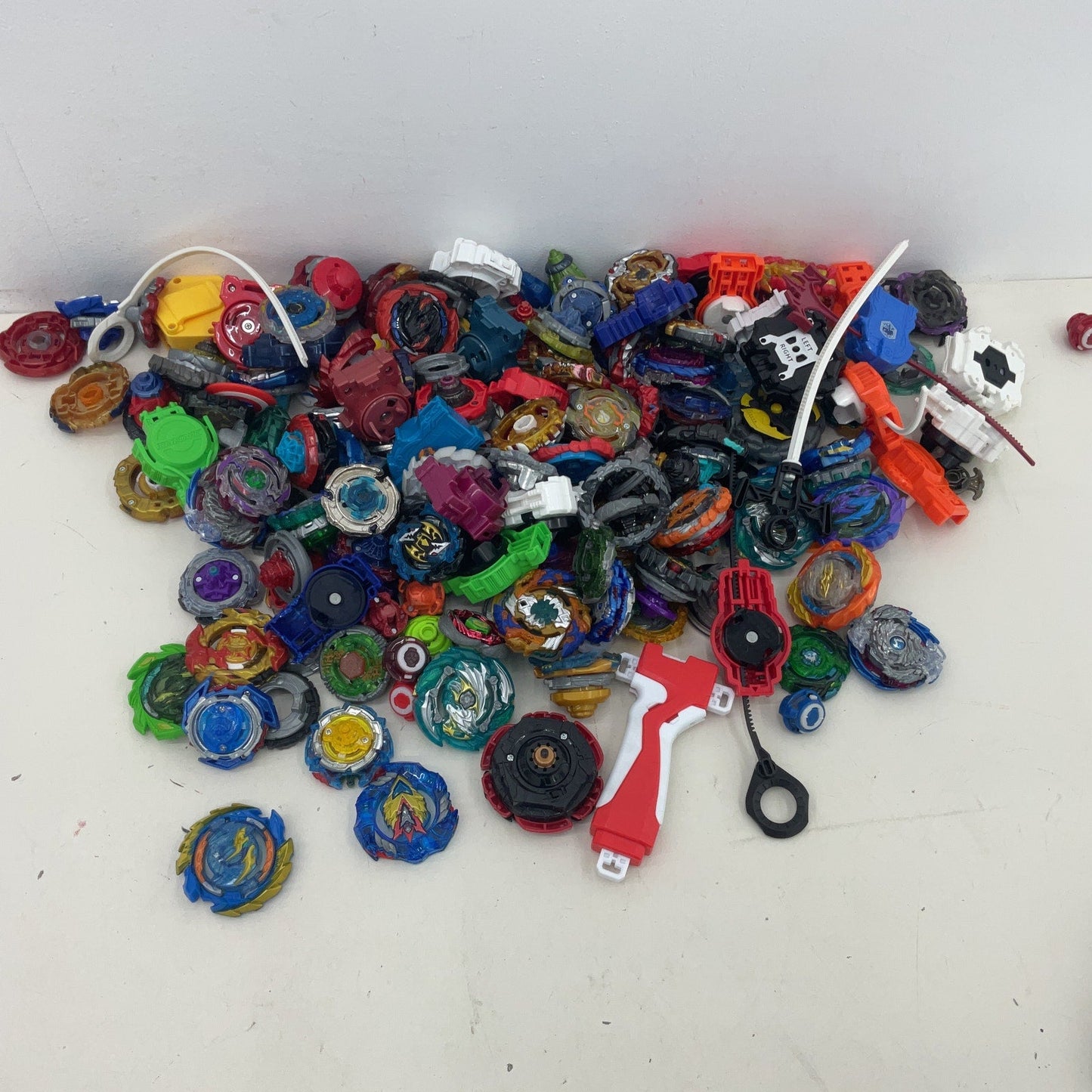 Preowned Beyblades Action Figure 10 lbs Collection LOT Toy Figures Parts Acc - Warehouse Toys