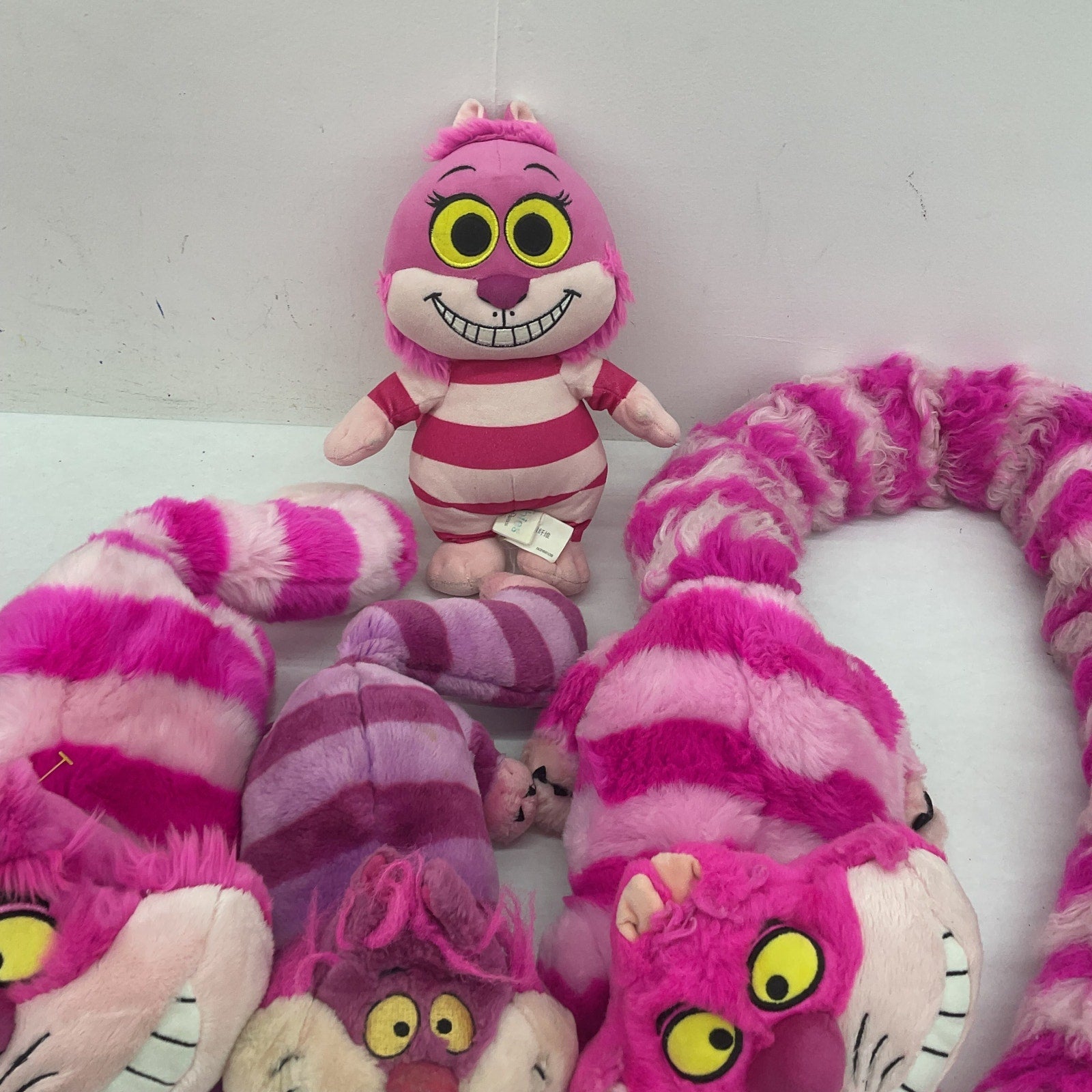 Preowned Cheshire Cat Plush Toys LOT Alice in Wonderland Collectible Mixed 5 lbs - Warehouse Toys