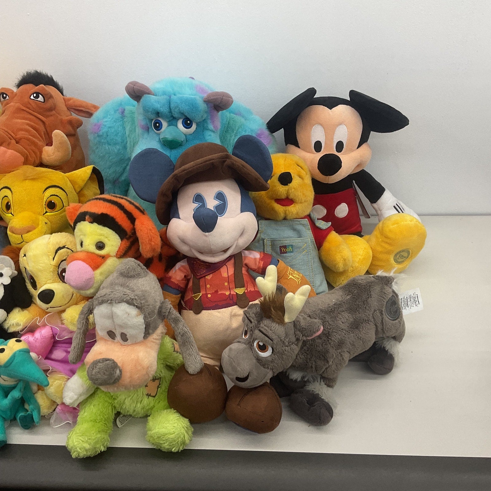 Preowned Disney Character Mixed Plush Dolls LOT Pixar Lion King Goofy Frozen - Warehouse Toys