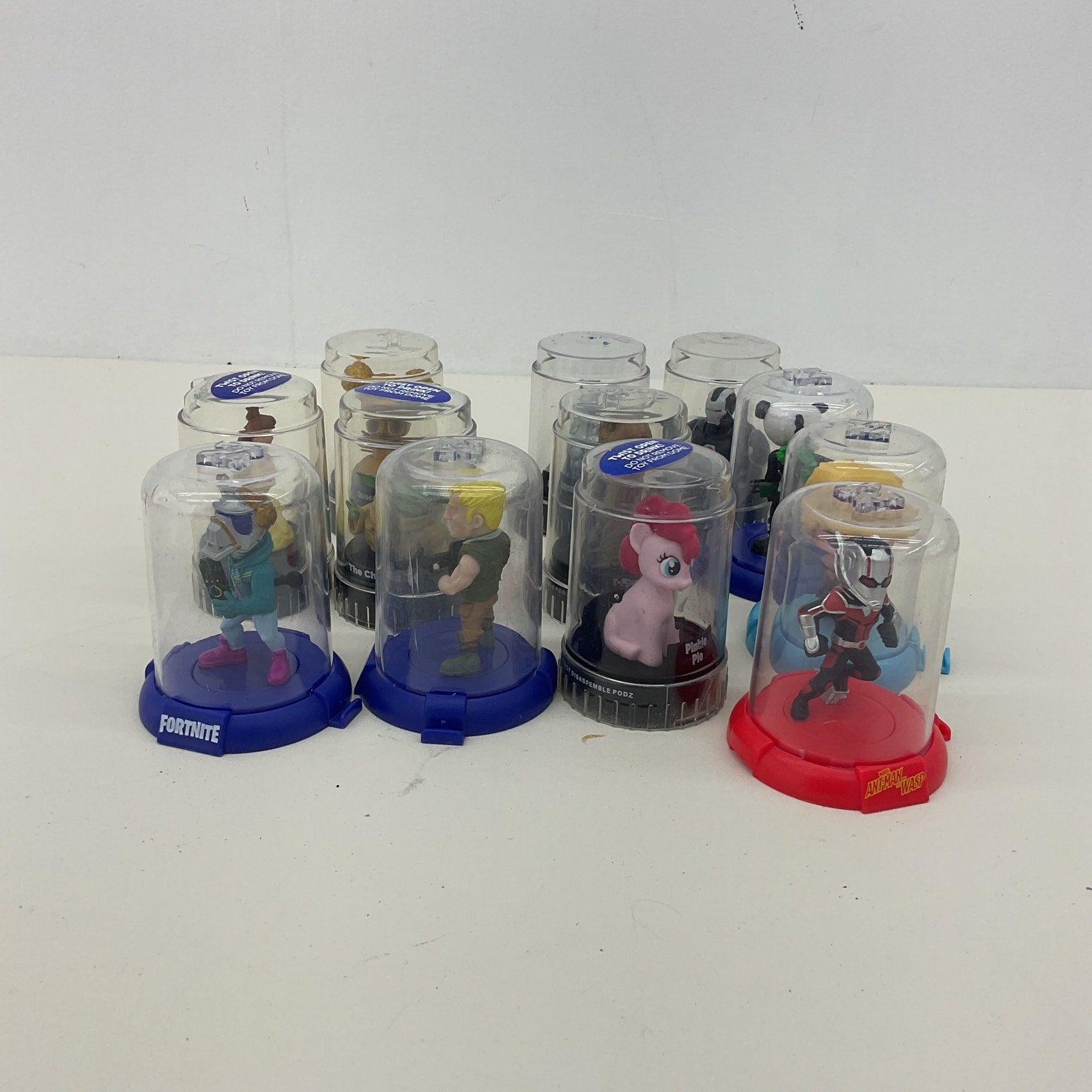 Preowned Disney Podz Assorted Toy Figures in Capsules LOT - Warehouse Toys