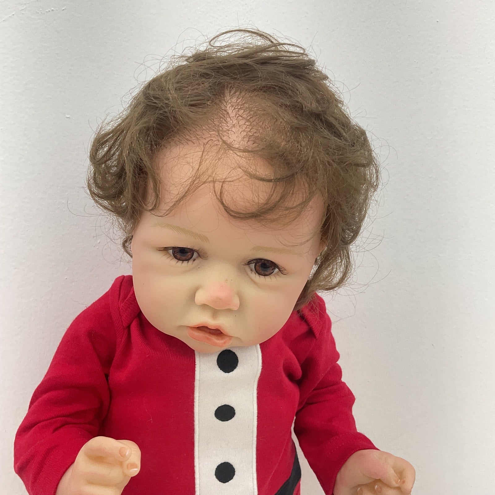 Preowned Hoomai Realistic Brunette Caucasian Baby Play Doll Toy in Santa Outfit - Warehouse Toys