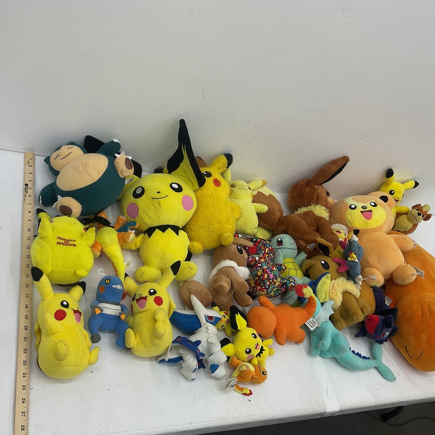 Preowned LOT 12 lbs Pokemon Stuffed Animals Mixed Characters Charmander Pichu - Warehouse Toys