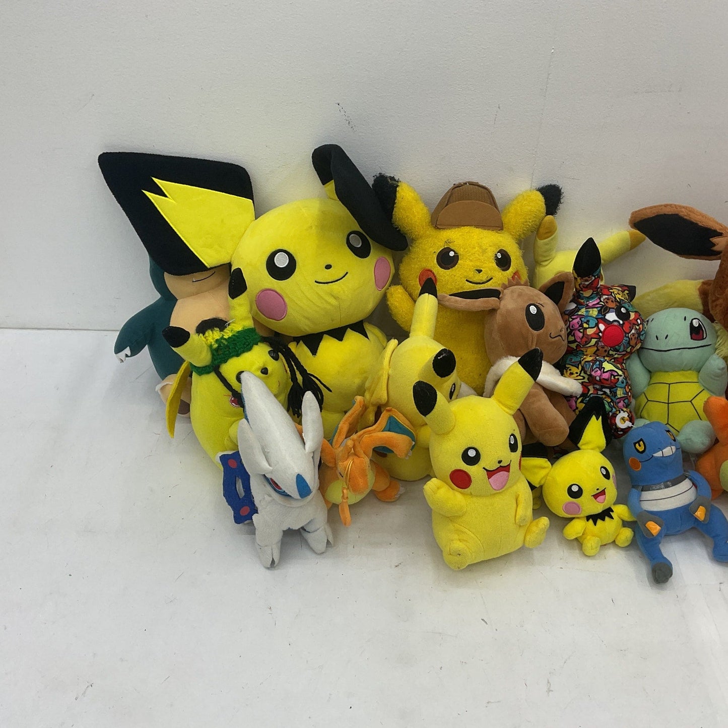 Preowned LOT 12 lbs Pokemon Stuffed Animals Mixed Characters Charmander Pichu - Warehouse Toys