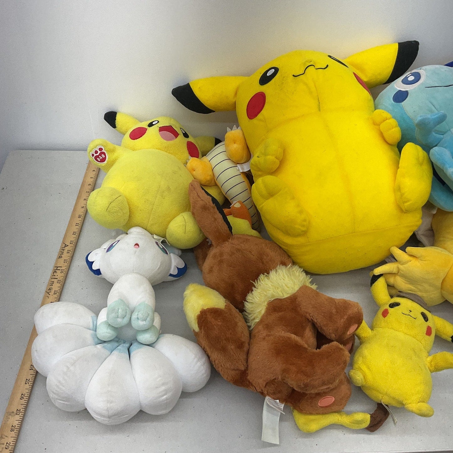 Preowned LOT 12 lbs Pokemon Stuffed Animals Mixed Characters RARE Alolan Vulpix! - Warehouse Toys