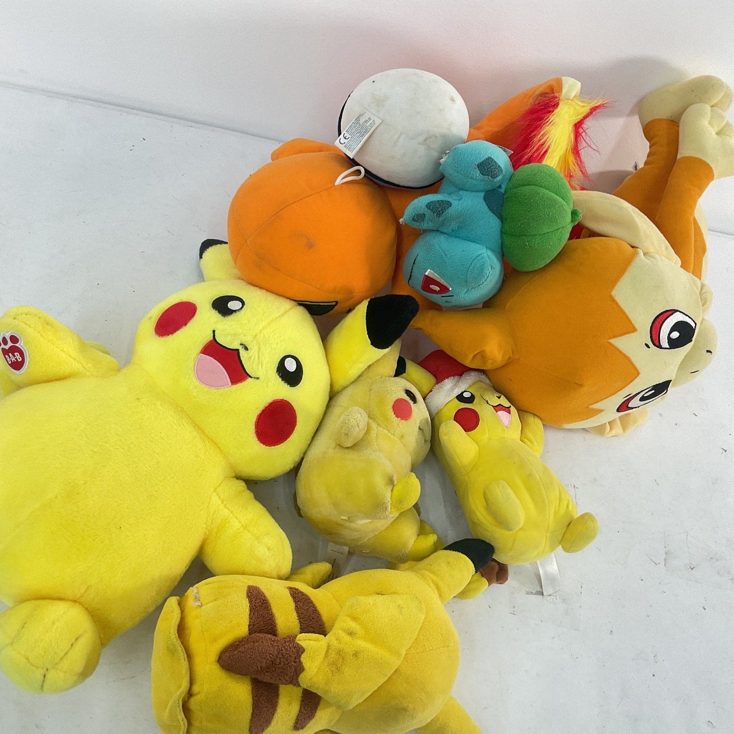 Preowned LOT 8 lbs Pokemon Stuffed Animals Mixed Characters Charmander Pikachu - Warehouse Toys