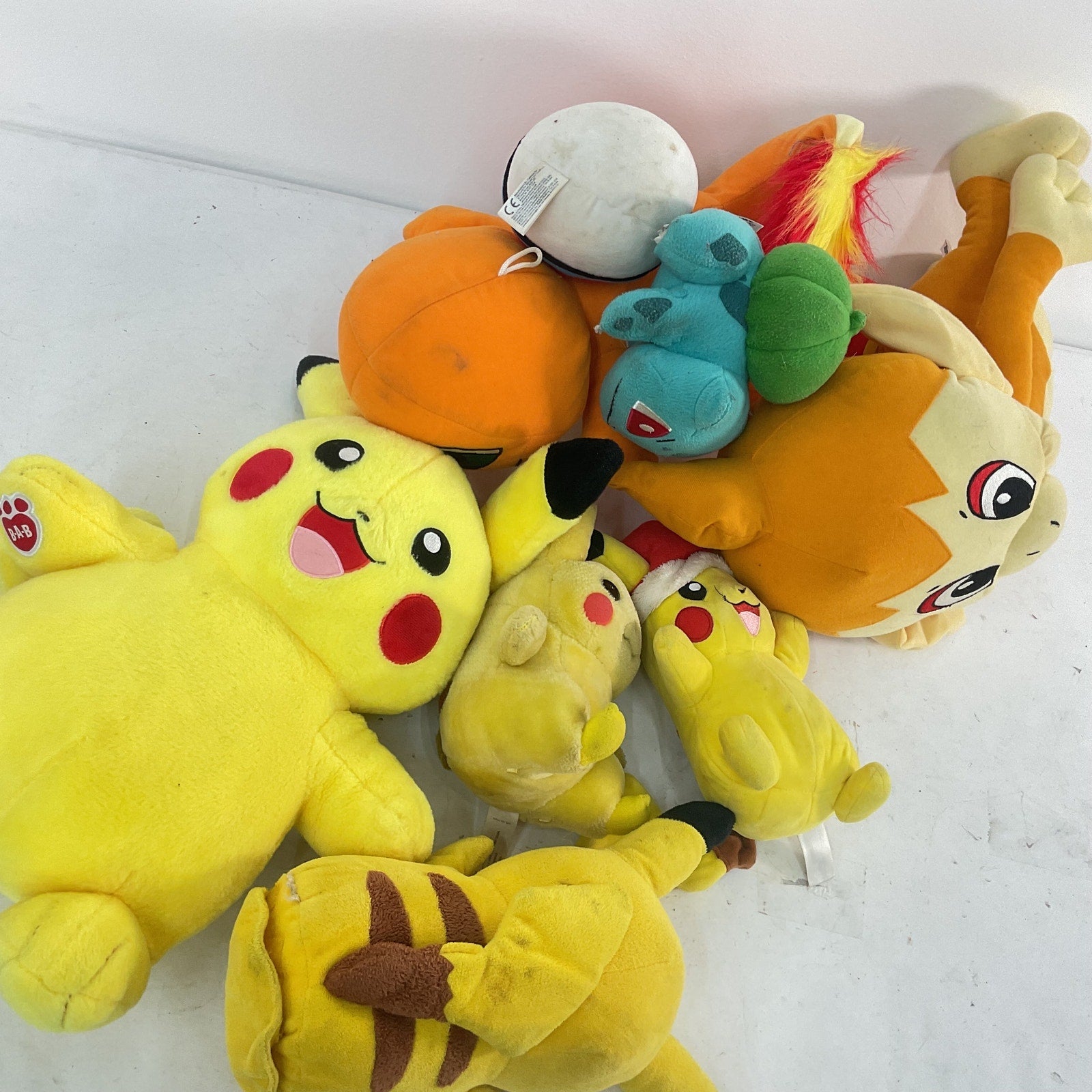 Preowned LOT 8 lbs Pokemon Stuffed Animals Mixed Characters Charmander Pikachu - Warehouse Toys