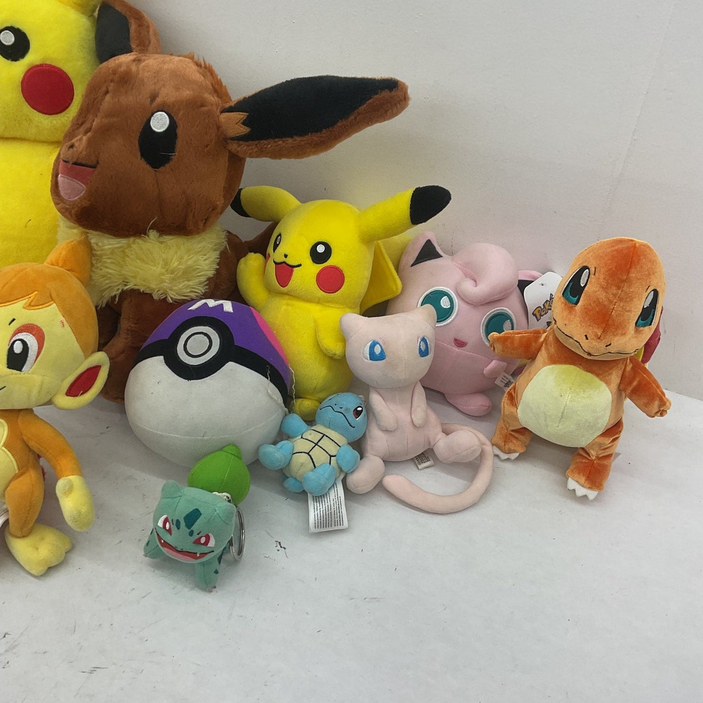 Preowned LOT Pokemon Stuffed Animals Mixed Characters Mewtwo Eevee Charmander - Warehouse Toys