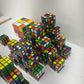 Preowned Mixed LOT 10 lbs Rubik's Cube & Other Brain Teaser Puzzle Square Toys - Warehouse Toys