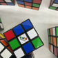 Preowned Mixed LOT 10 lbs Rubik's Cube & Other Brain Teaser Puzzle Square Toys - Warehouse Toys