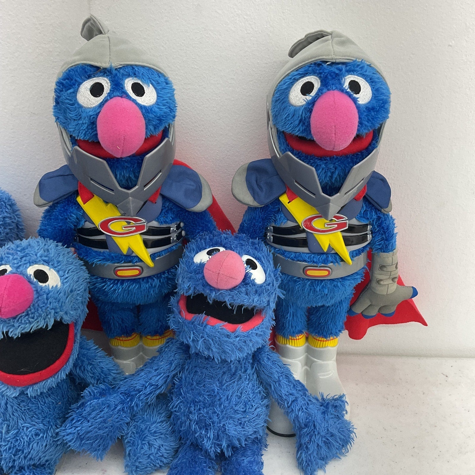 Preowned Mixed LOT Sesame Street Super Grover Character Plush Dolls Stuffed Toys - Warehouse Toys