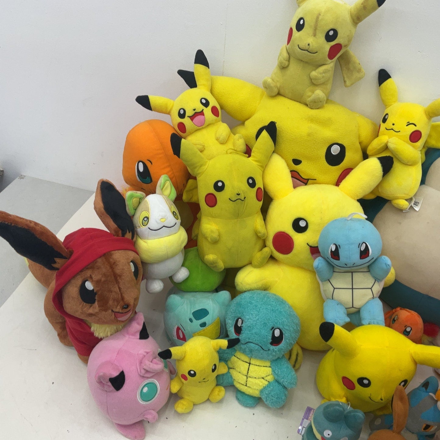 Preowned Multicolor Pokemon Plush LOT 13 lbs Charizard Eevee Snorlax Pikachu - Warehouse Toys