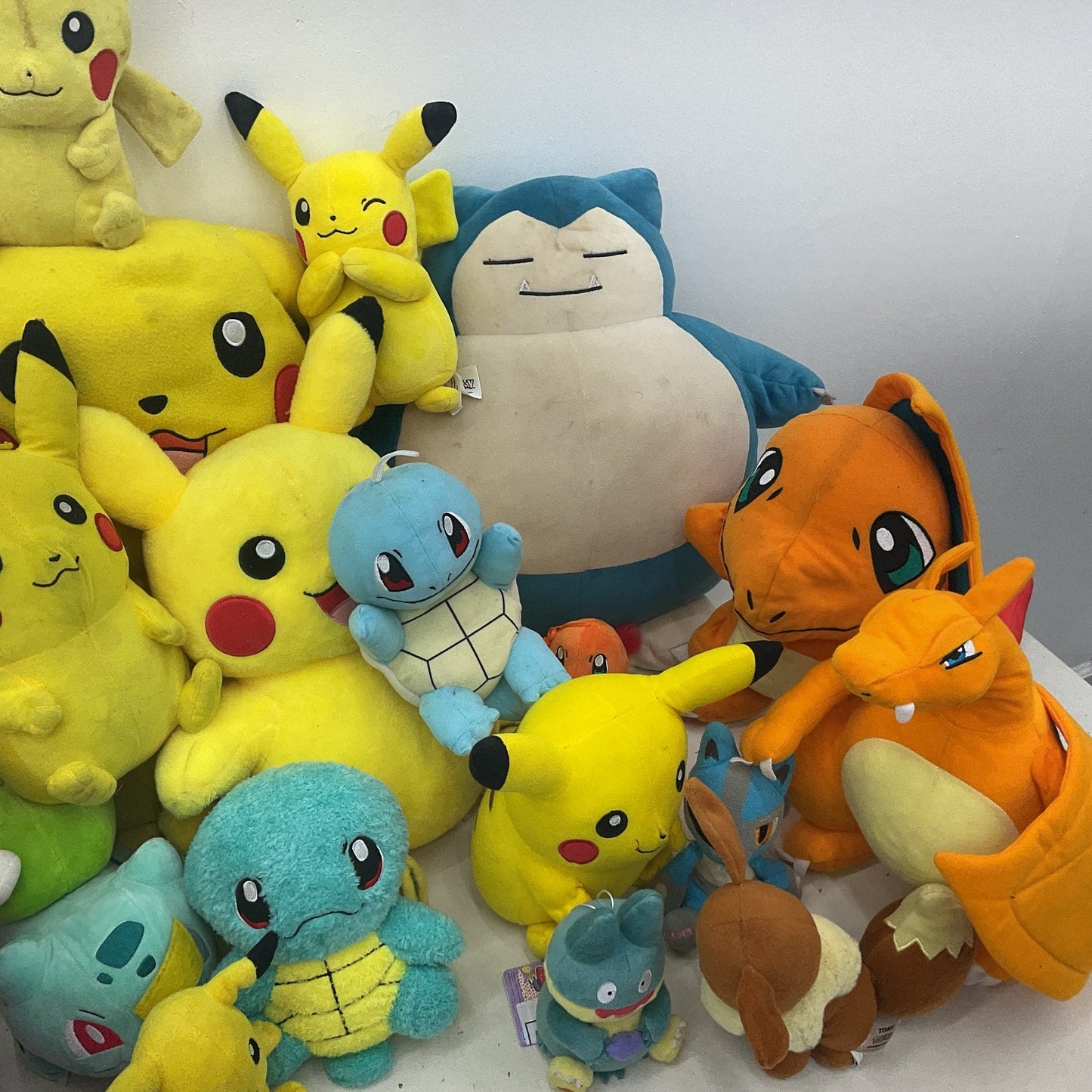 Preowned Multicolor Pokemon Plush LOT 13 lbs Charizard Eevee Snorlax Pikachu - Warehouse Toys