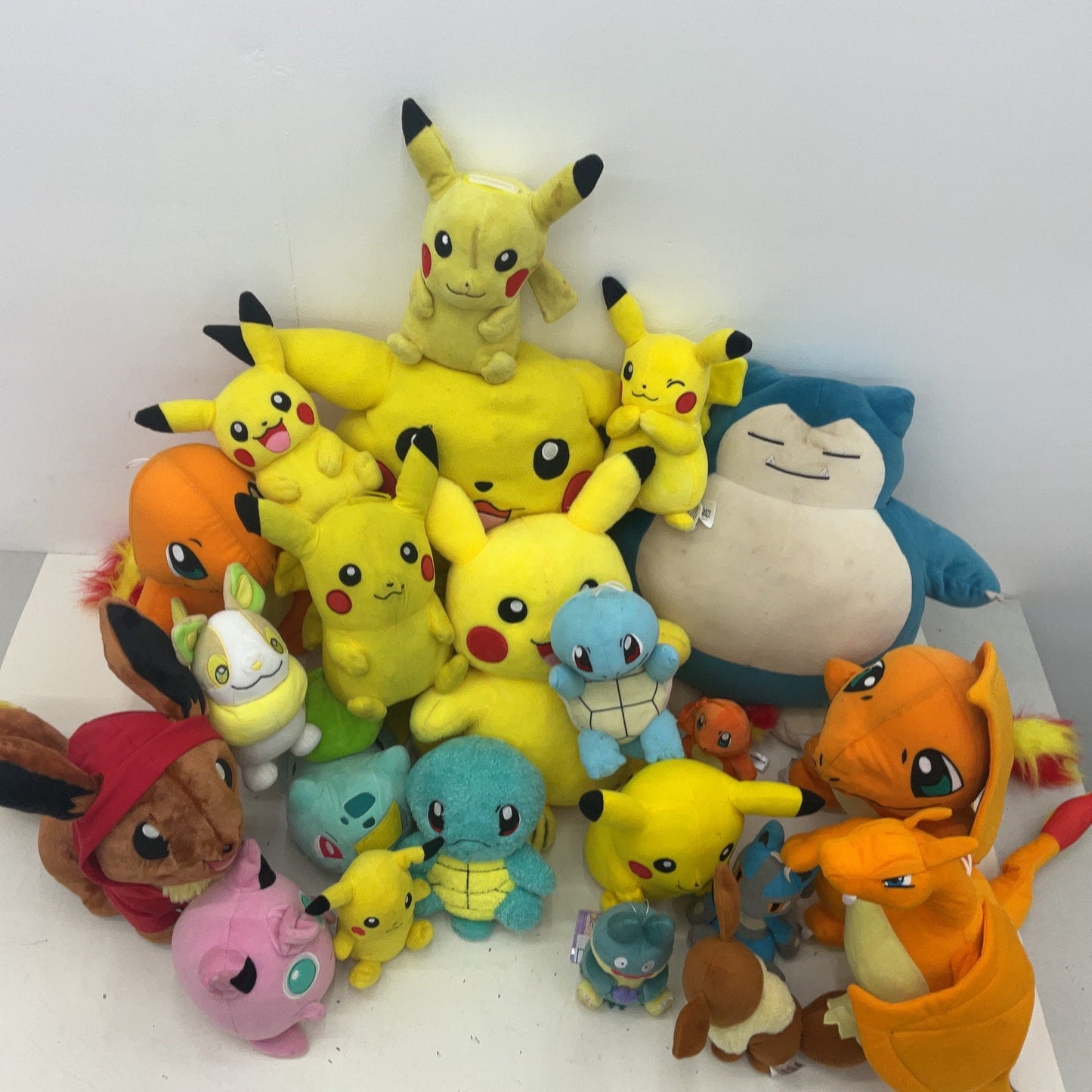 Preowned Multicolor Pokemon Plush LOT 13 lbs Charizard Eevee Snorlax Pikachu - Warehouse Toys