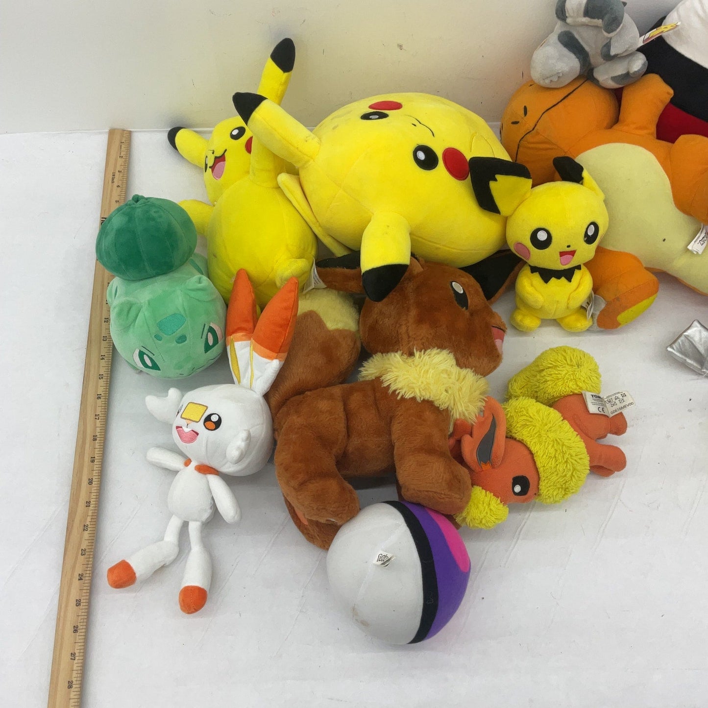 Preowned Multicolor Pokemon Stuffed Animal Toys LOT 12 lbs Eevee Charmander - Warehouse Toys