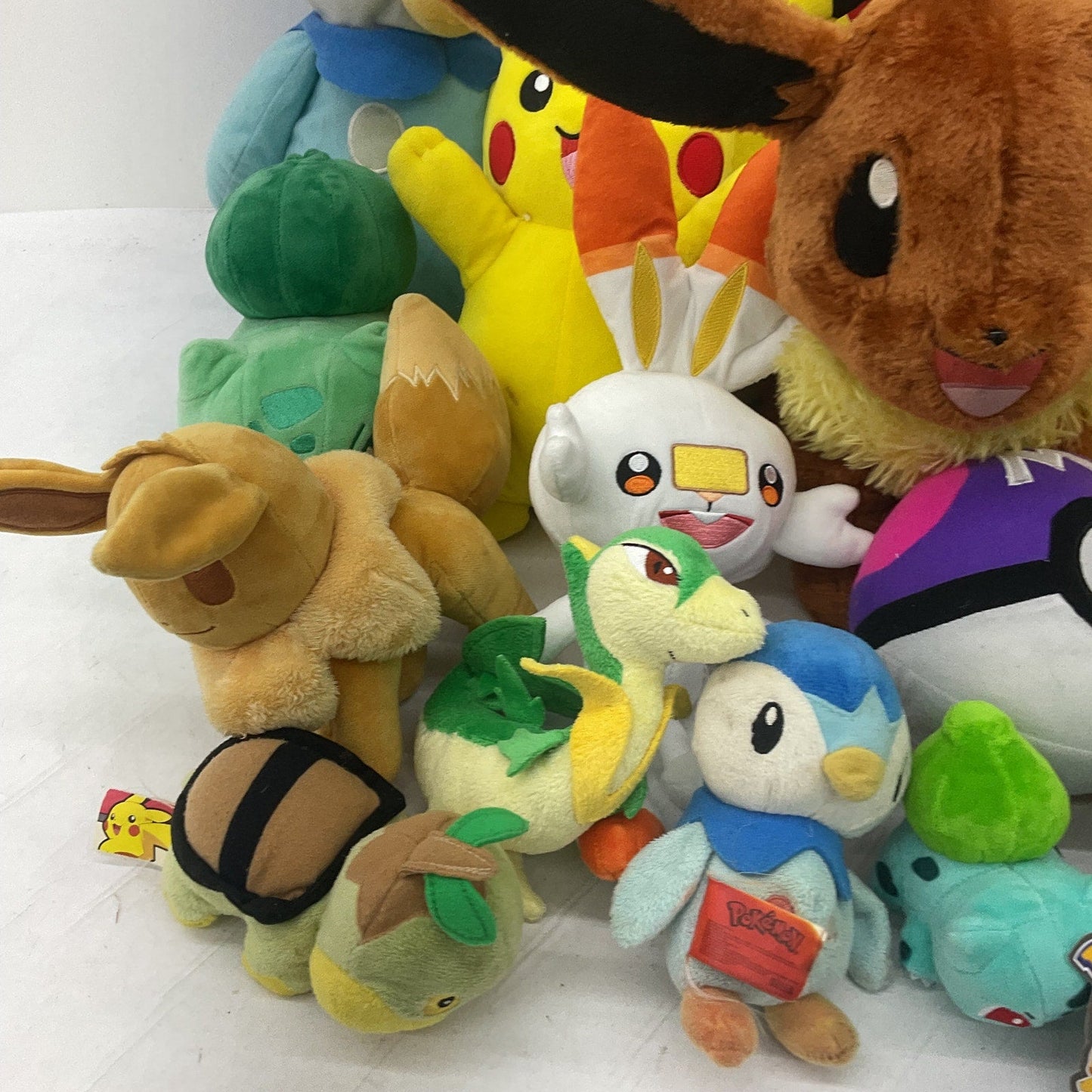 Preowned Multicolor Pokemon Stuffed Animal Toys LOT 12 lbs Eevee Charmander - Warehouse Toys