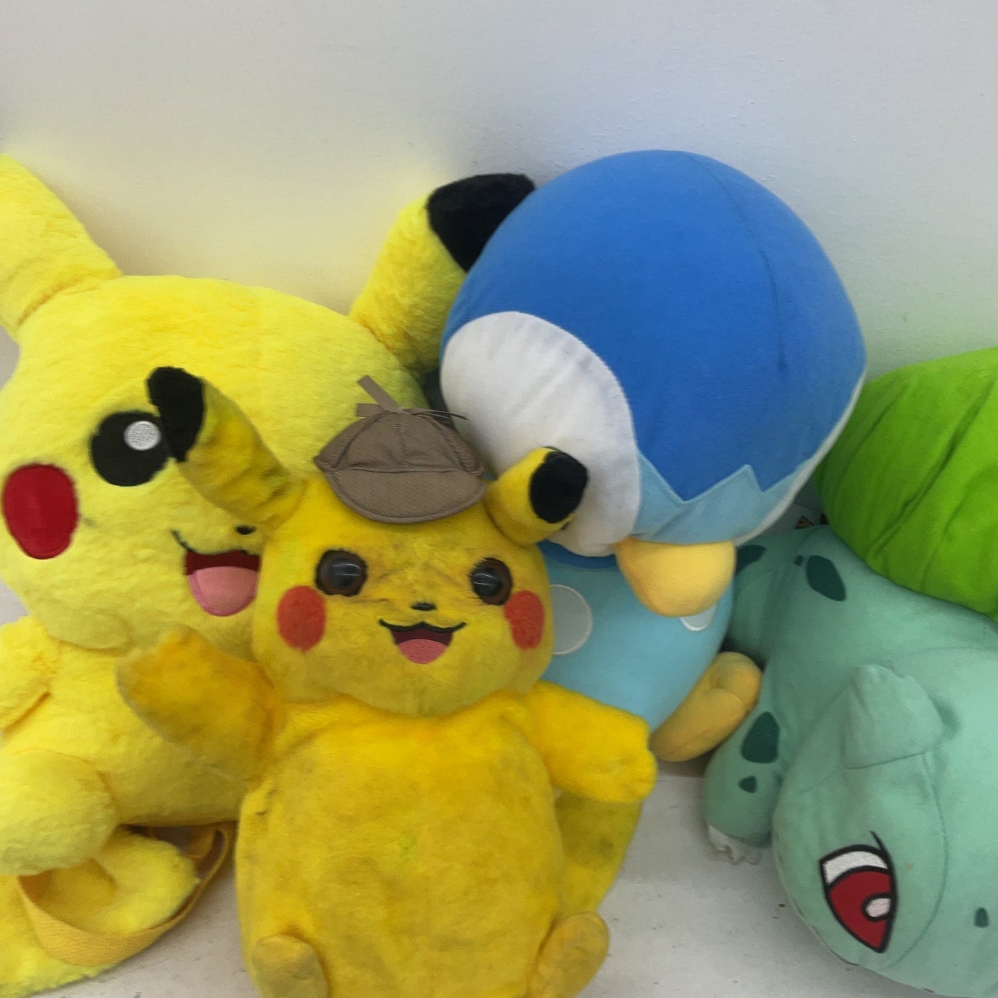 Preowned Multicolor Pokemon Stuffed Animals LOT Detective Pikachu Bulbasaur Bird - Warehouse Toys