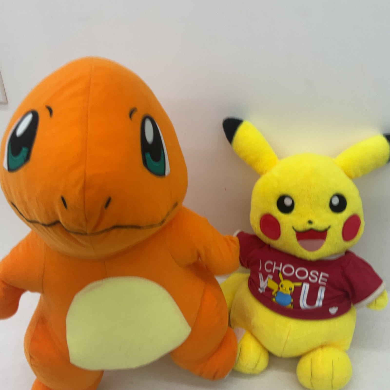 Preowned Orange Charmander & Yellow Pikachu Pokemon Stuffed Animals LOT of 2 - Warehouse Toys