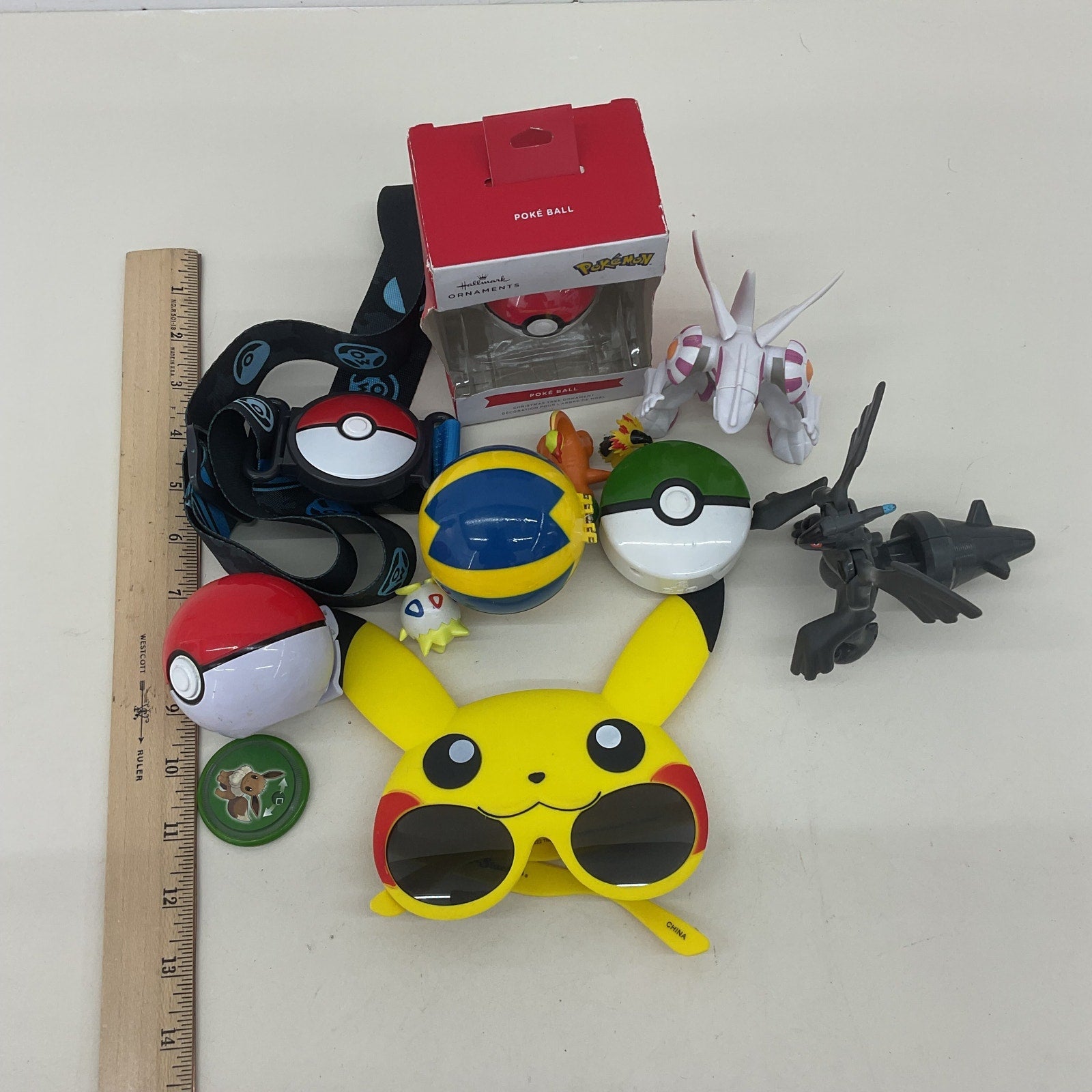 Preowned Pokemon Yellow Plastic Action Figure Lot Pikachu Glasses Toys Lot - Warehouse Toys