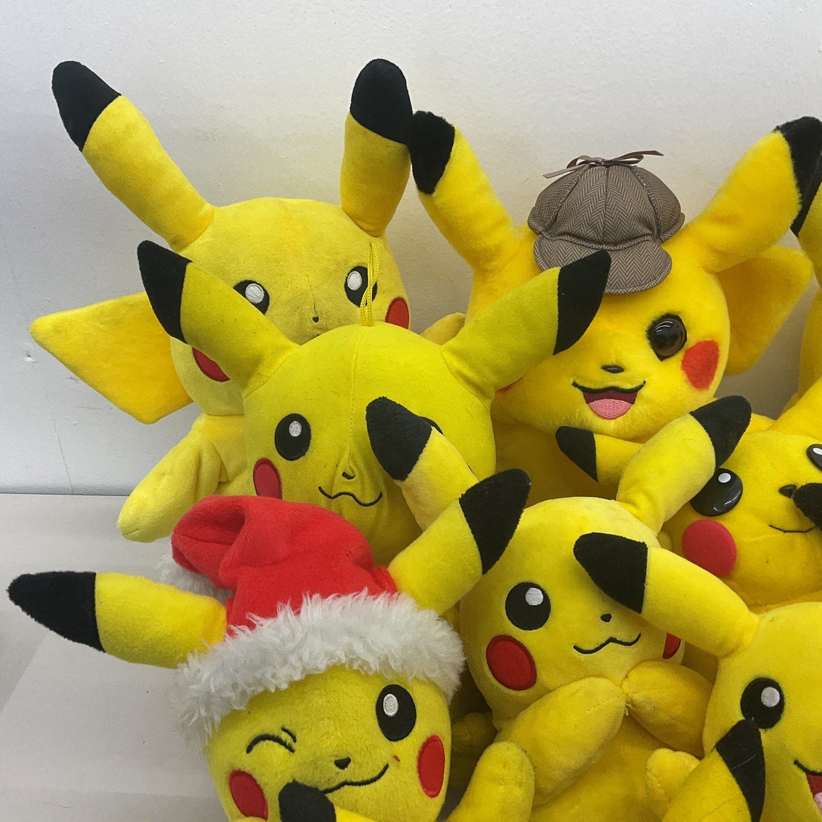 Preowned Pokemon Yellow Plush LOT PIKACHU Detective Holiday Mixed Expressions - Warehouse Toys