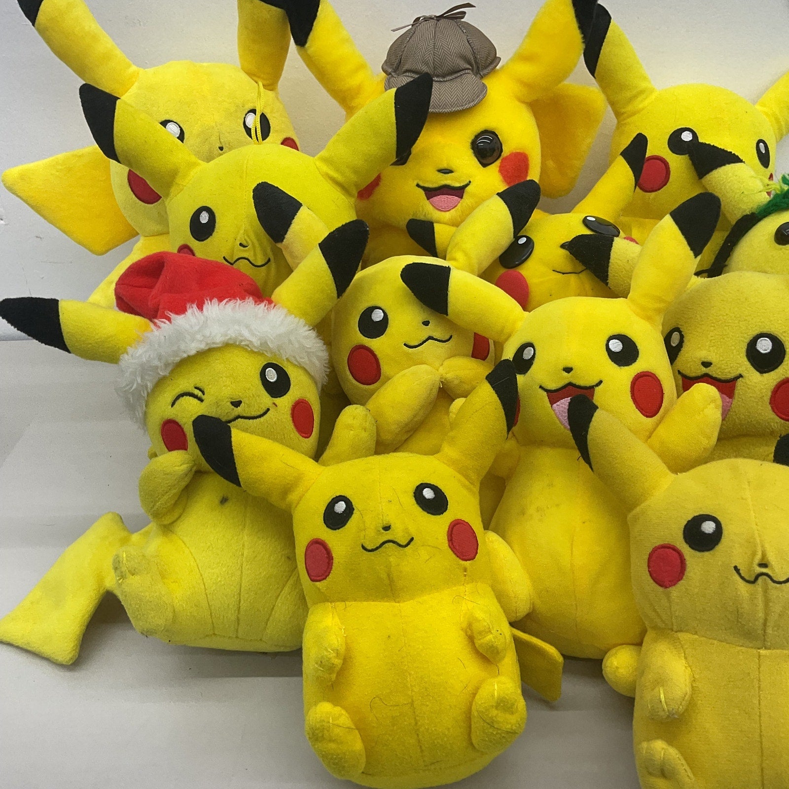 Preowned Pokemon Yellow Plush LOT PIKACHU Detective Holiday Mixed Expressions - Warehouse Toys