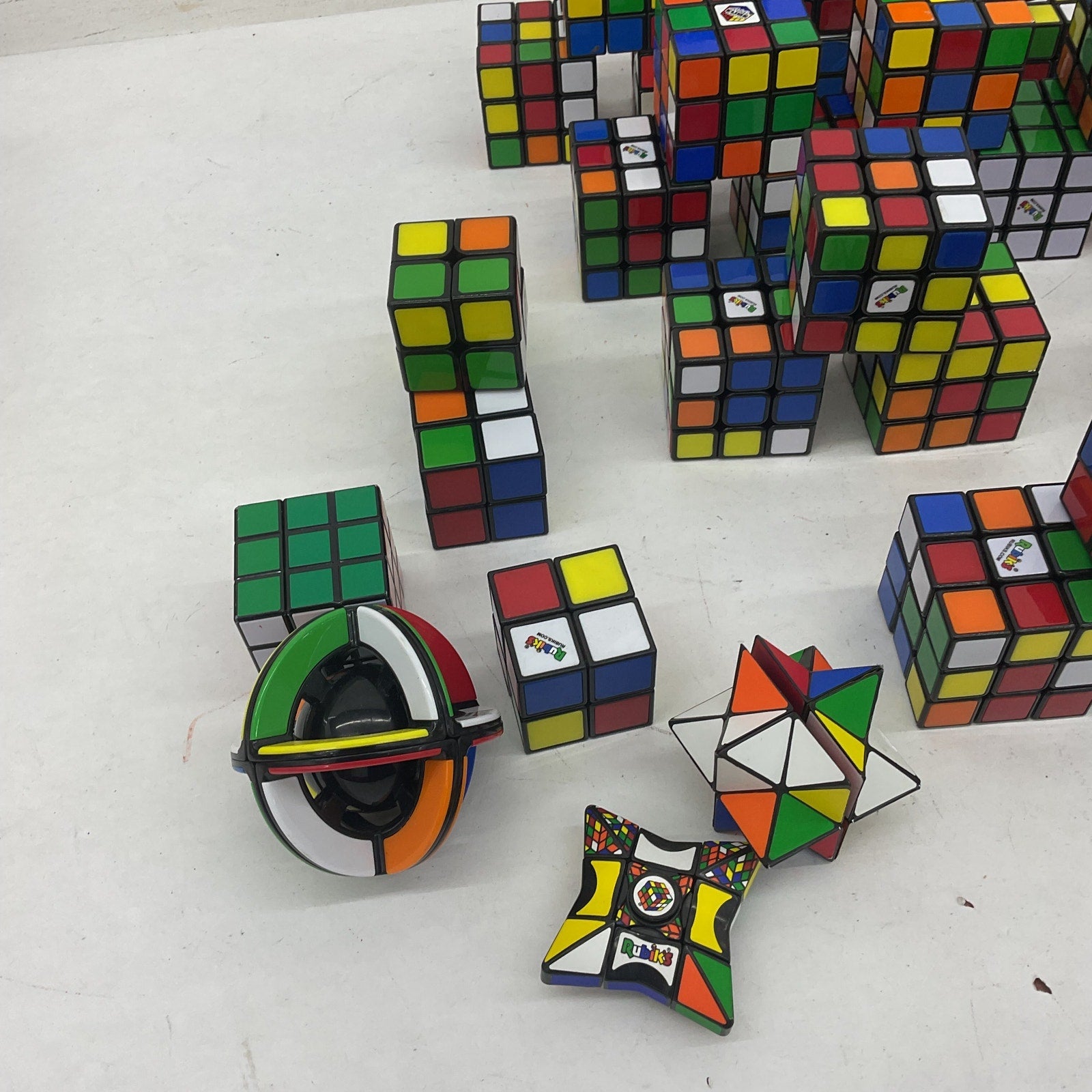 Preowned Rubik's Cube & Others Brain Teasers Puzzles Puzzle Twist Cubes LOT 7lbs - Warehouse Toys