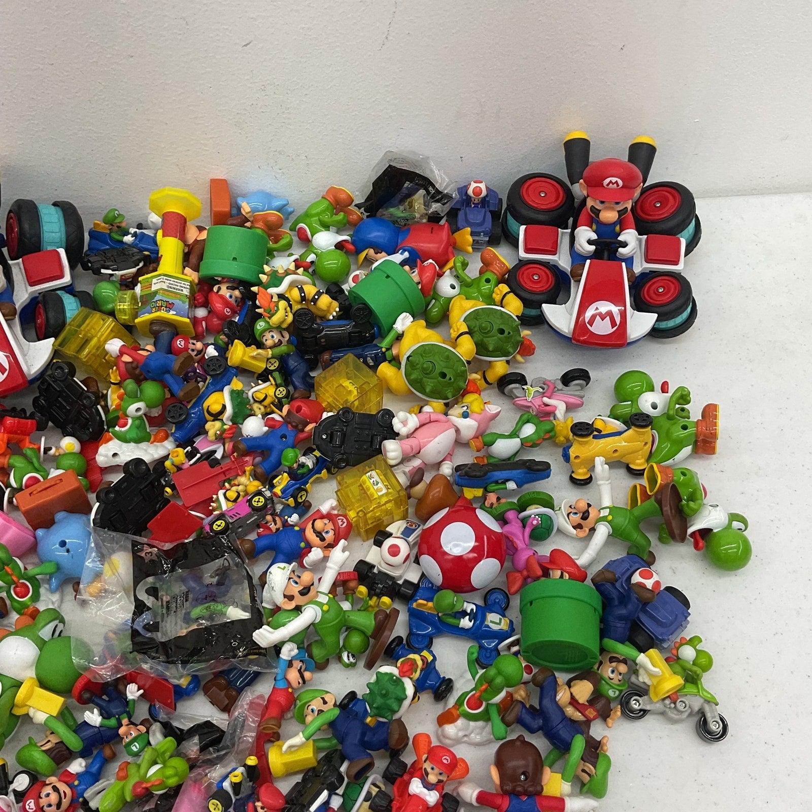 Preowned Super Mario 15 lbs Kart Action Figures Vehicles Toys Accessories LOT - Warehouse Toys