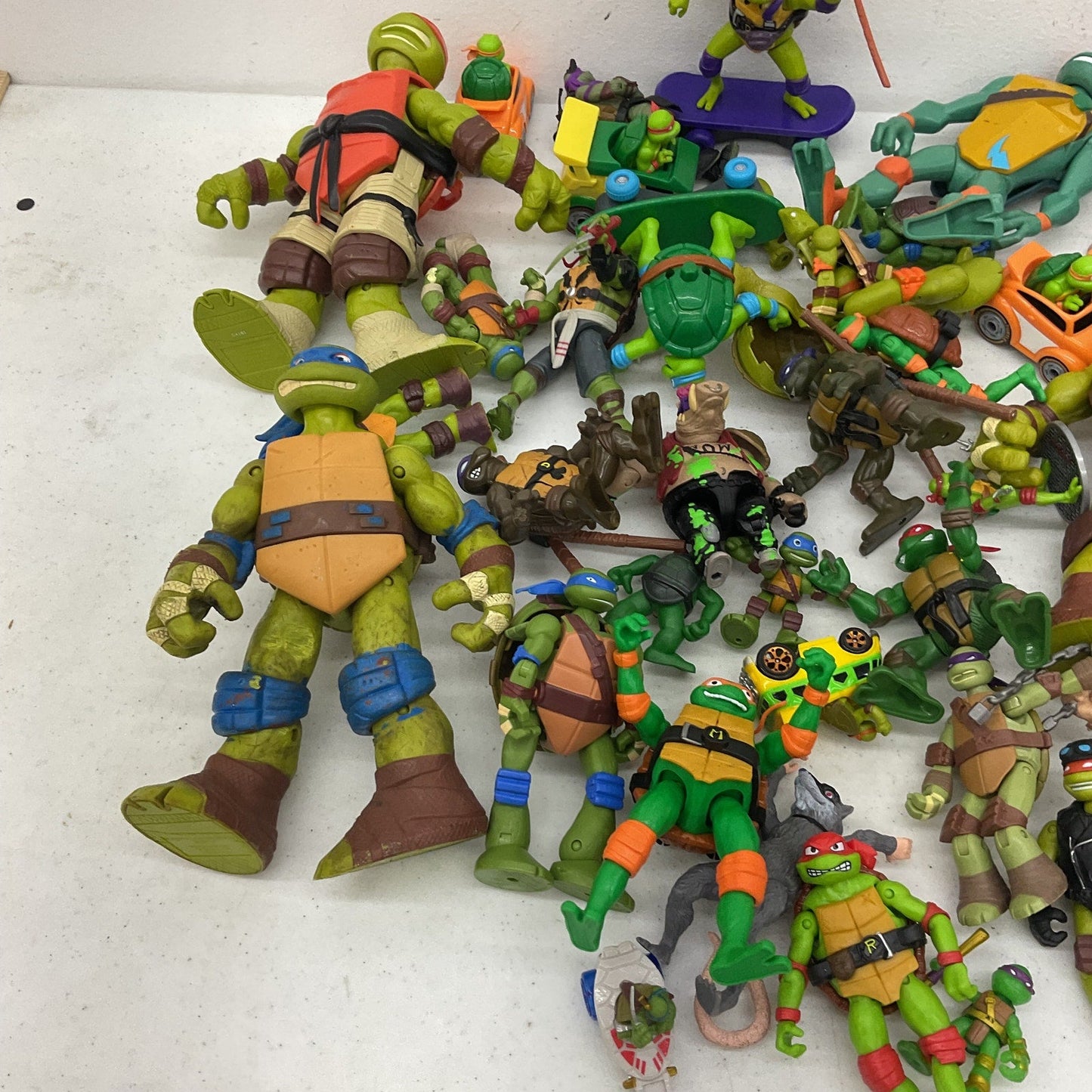 Preowned TMNT 10 lbs Action Figure Collection Ninja Turtles LOT Toys Vehicles - Warehouse Toys