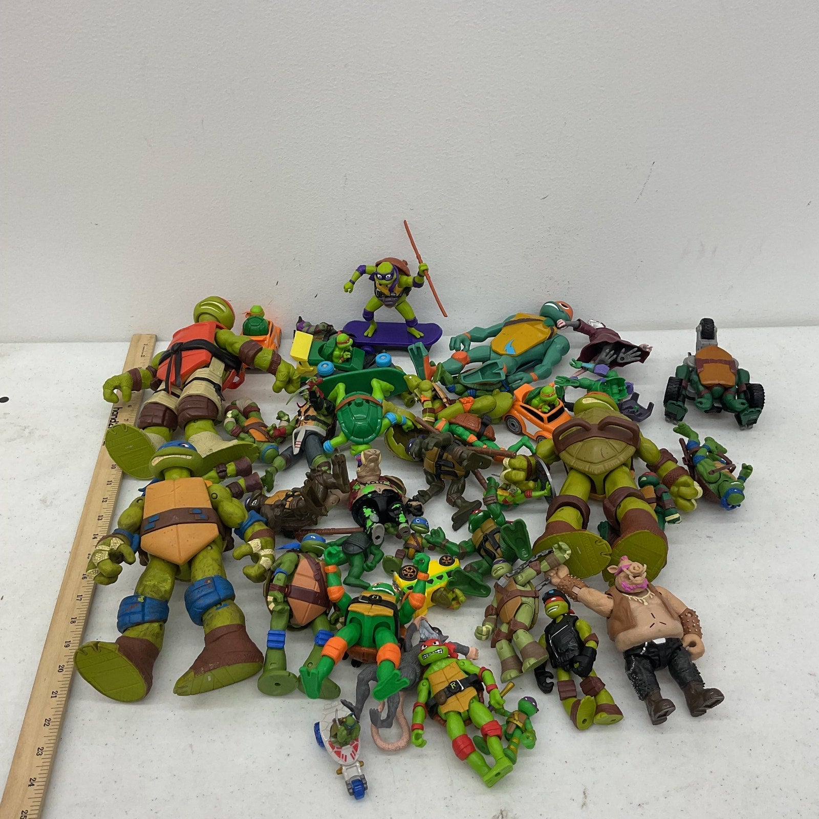 Preowned TMNT 10 lbs Action Figure Collection Ninja Turtles LOT Toys Vehicles - Warehouse Toys