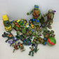 Preowned TMNT Action Figure Collection Ninja Turtles LOT 9 lbs Toys Vehicles - Warehouse Toys