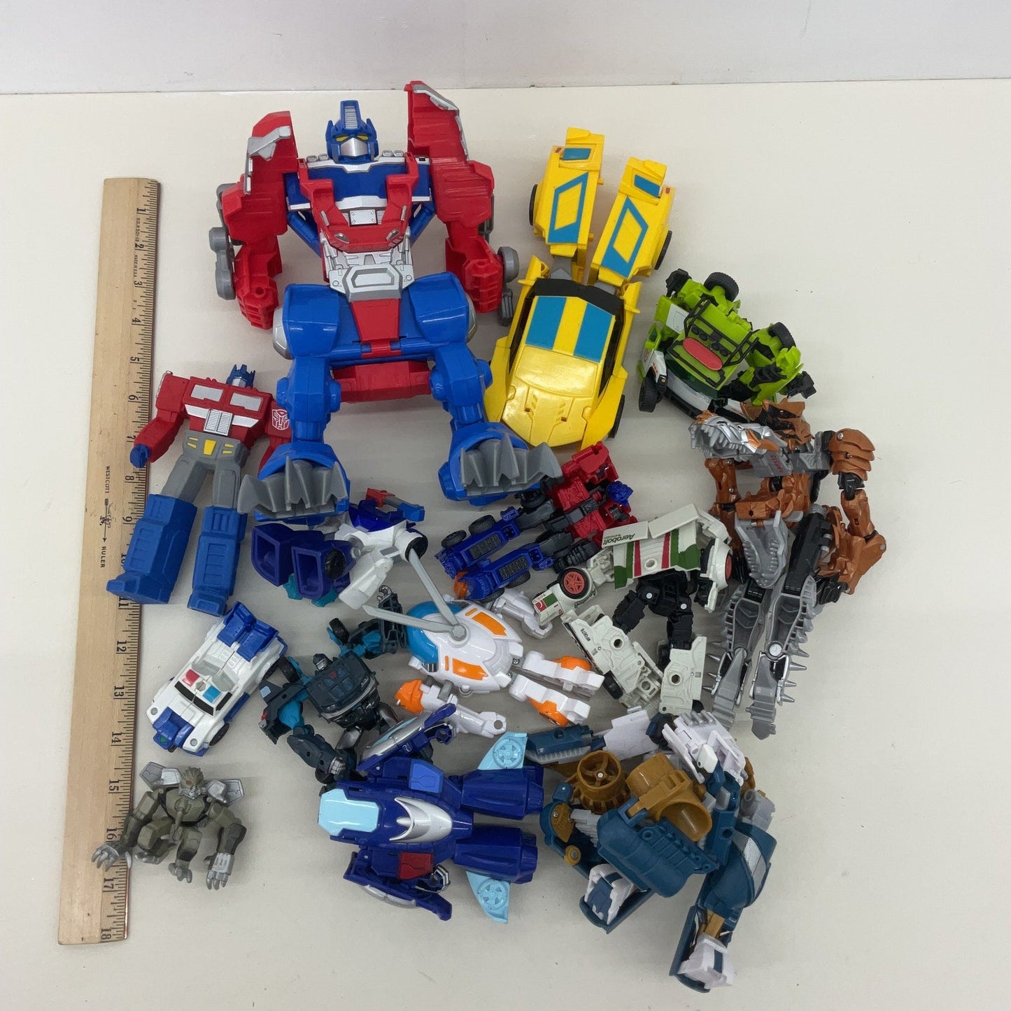 Preowned Transformers Red Yellow Green Blue Action Figure Toys Lot - Warehouse Toys