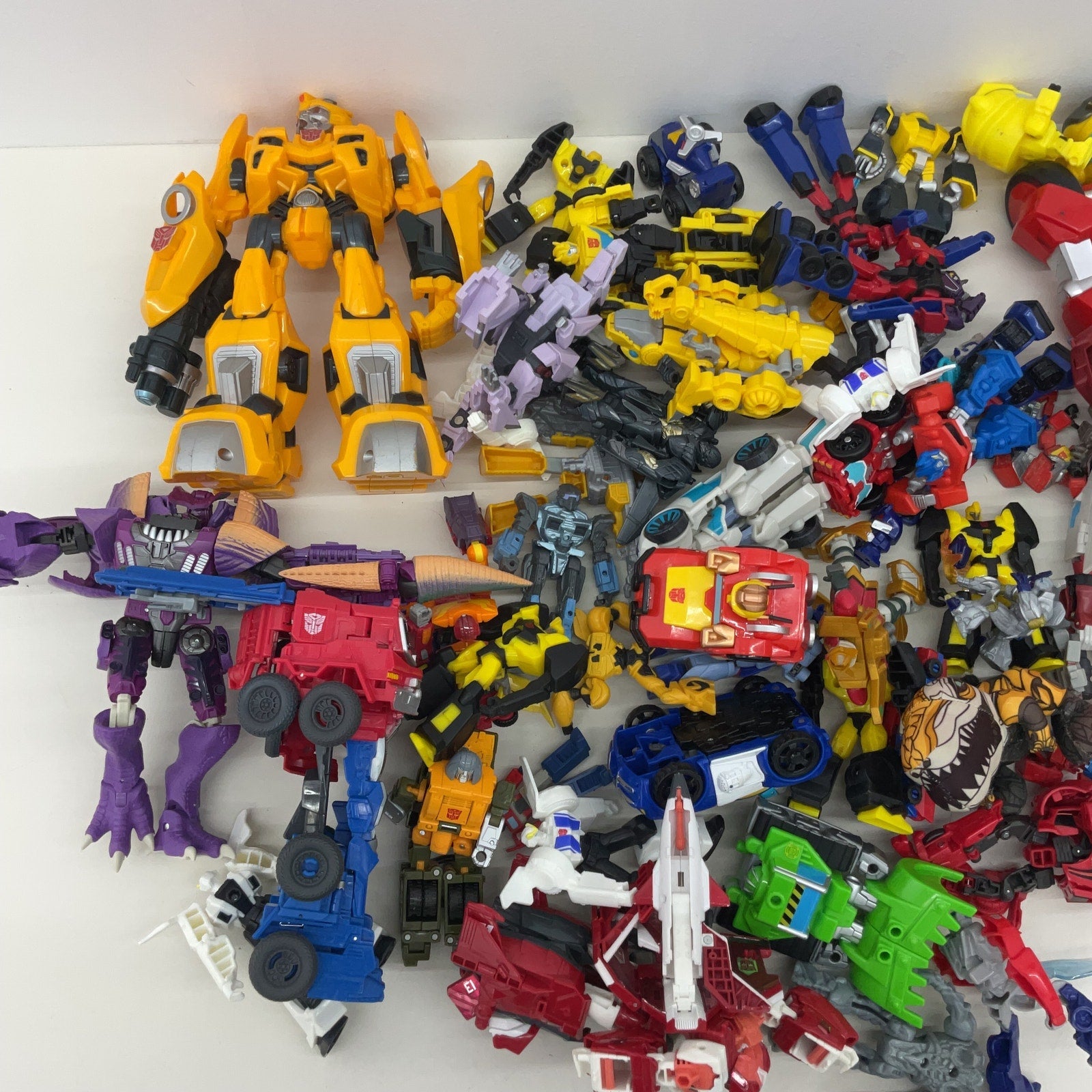 Preowned Transformers Yellow Red Blue Movie Action Figure Wholesale Lot - Warehouse Toys