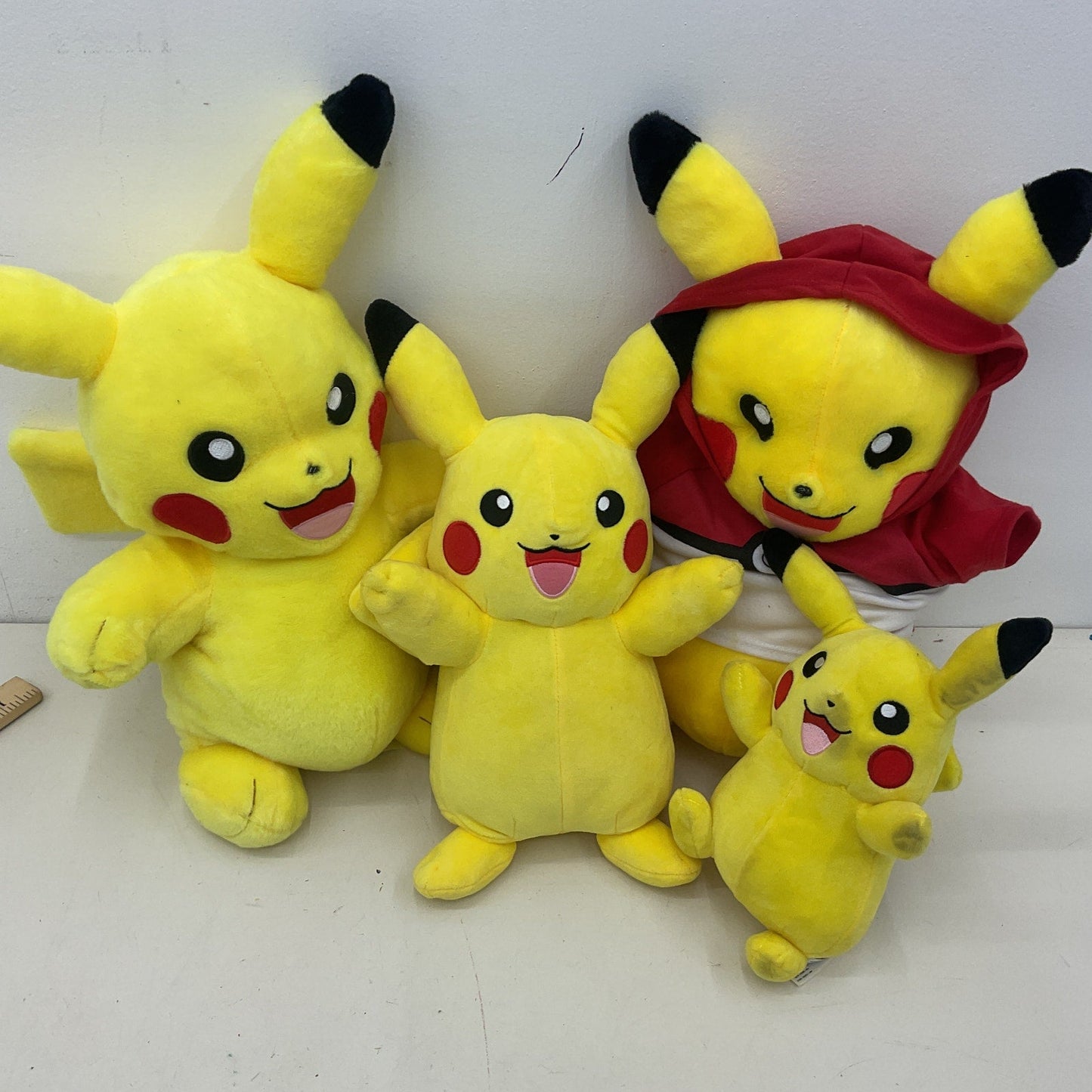 Preowned Yellow Pokemon Plush Toys Mixed Pikachu Character Doll LOT of 4 - Warehouse Toys