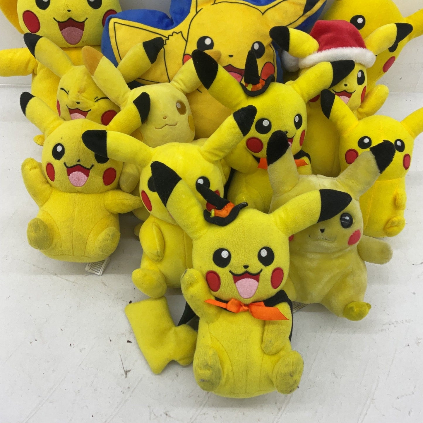 Preowned Yellow Pokémon Plush Toys Pikachu Assorted Designs 5 lbs LOT - Warehouse Toys