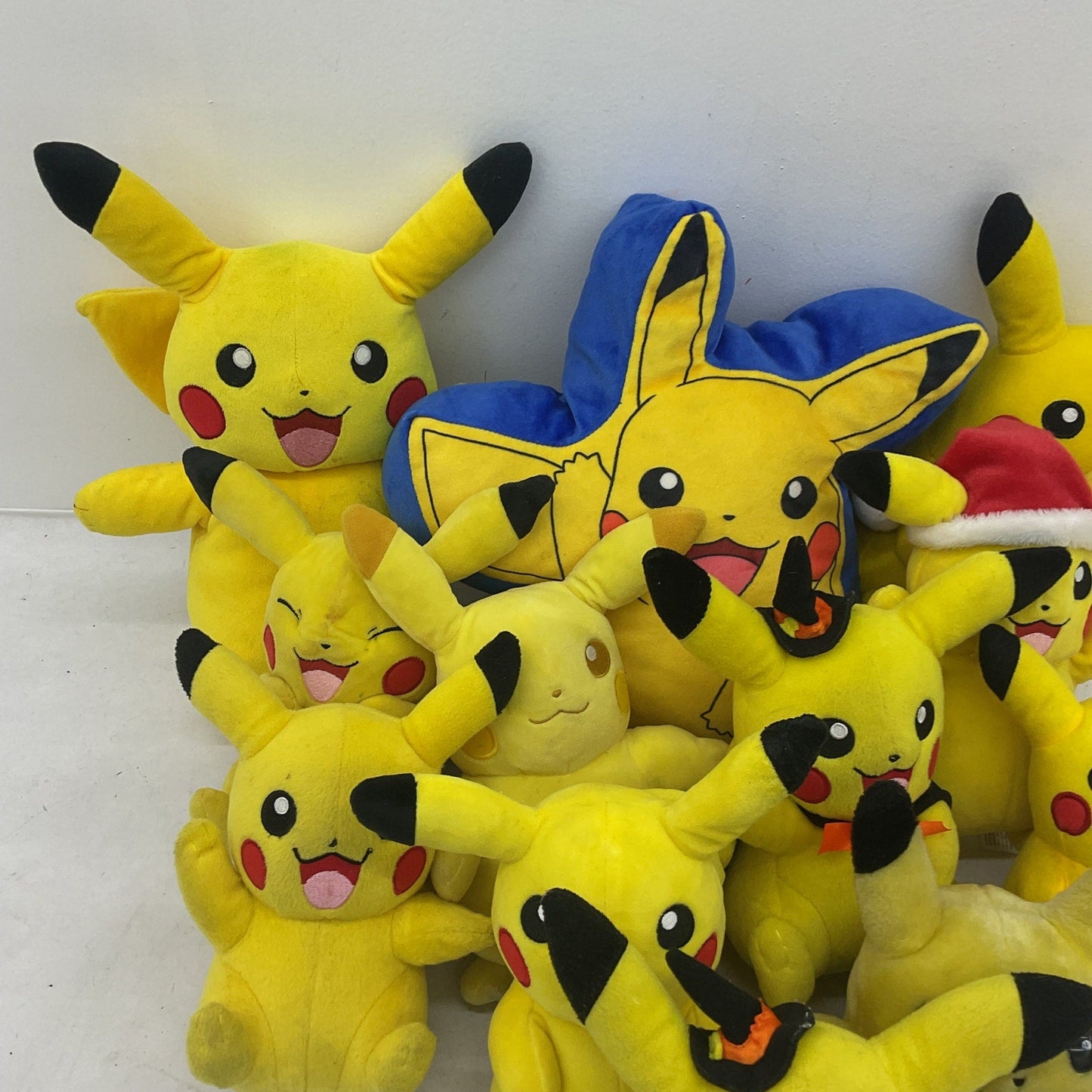 Preowned Yellow Pokémon Plush Toys Pikachu Assorted Designs 5 lbs LOT - Warehouse Toys